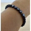 Bracelet mot 'BAHAI' perles noires